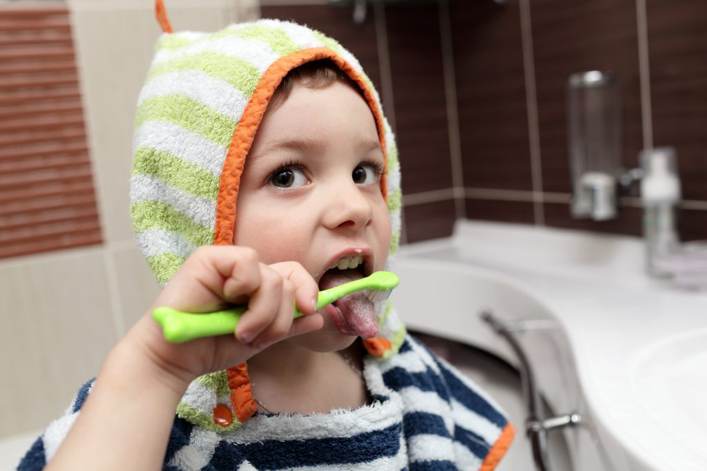 Child brushing his teeth Ponte Vedra Pediatric Dentistry